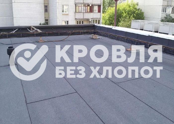 Укладка рубероида на крышу панельного дома